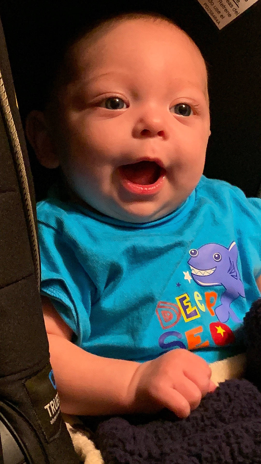 Colton joined the competition — help win amazing prizes! arm, baby, baby_toddler_clothing, black, cheek, eye, face, finger, gesture, hand, human_body, iris, lip, mammal, mouth, neck, nose, person, skin, sleeve
