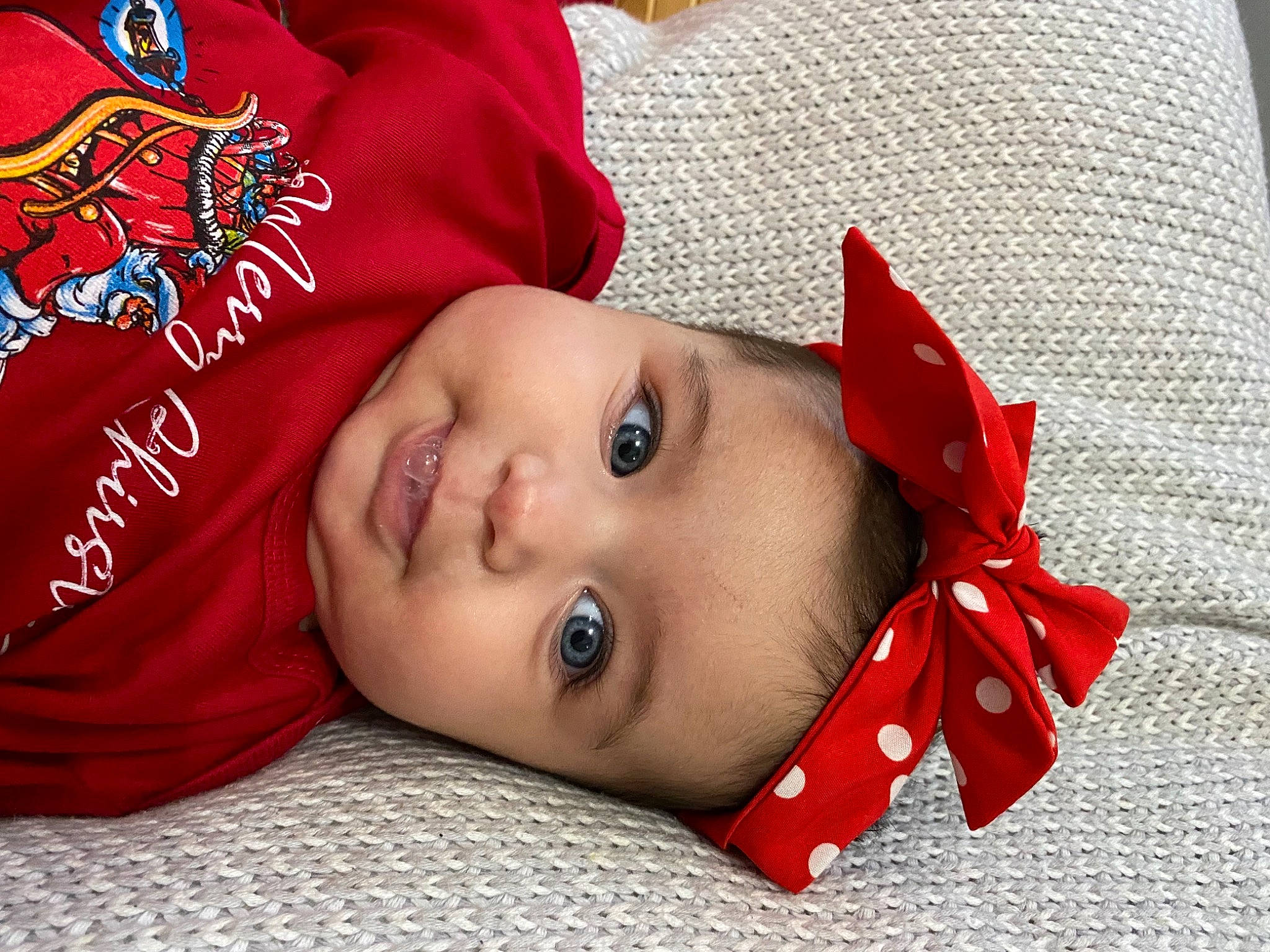 Anais joined the competition — help win amazing prizes! baby, baby_toddler_clothing, carmine, child, comfort, eye, face, fashion_accessory, happy, hat, headwear, linens, lip, nose, pattern, person, skin, sleeve, smile, textile