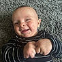 baby, infant, smiling, hands, carpet, striped_clothing, happy, cute, child, portrait, indoor, closeup, person, young, skin, head, face, expression, fingers, toddler
