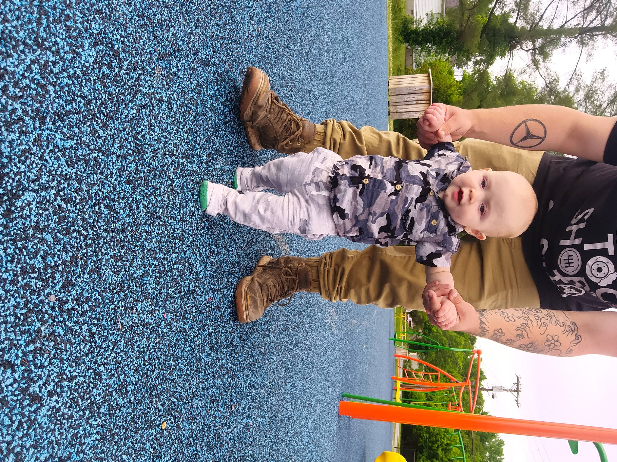 Dalton is registered to the contest to win money with this photo: asphalt, baby, child, flooring, fun, grass, happy, human_leg, leisure, people_in_nature, person, plant, play, recreation, road_surface, soil, tar, thigh, toddler, tree