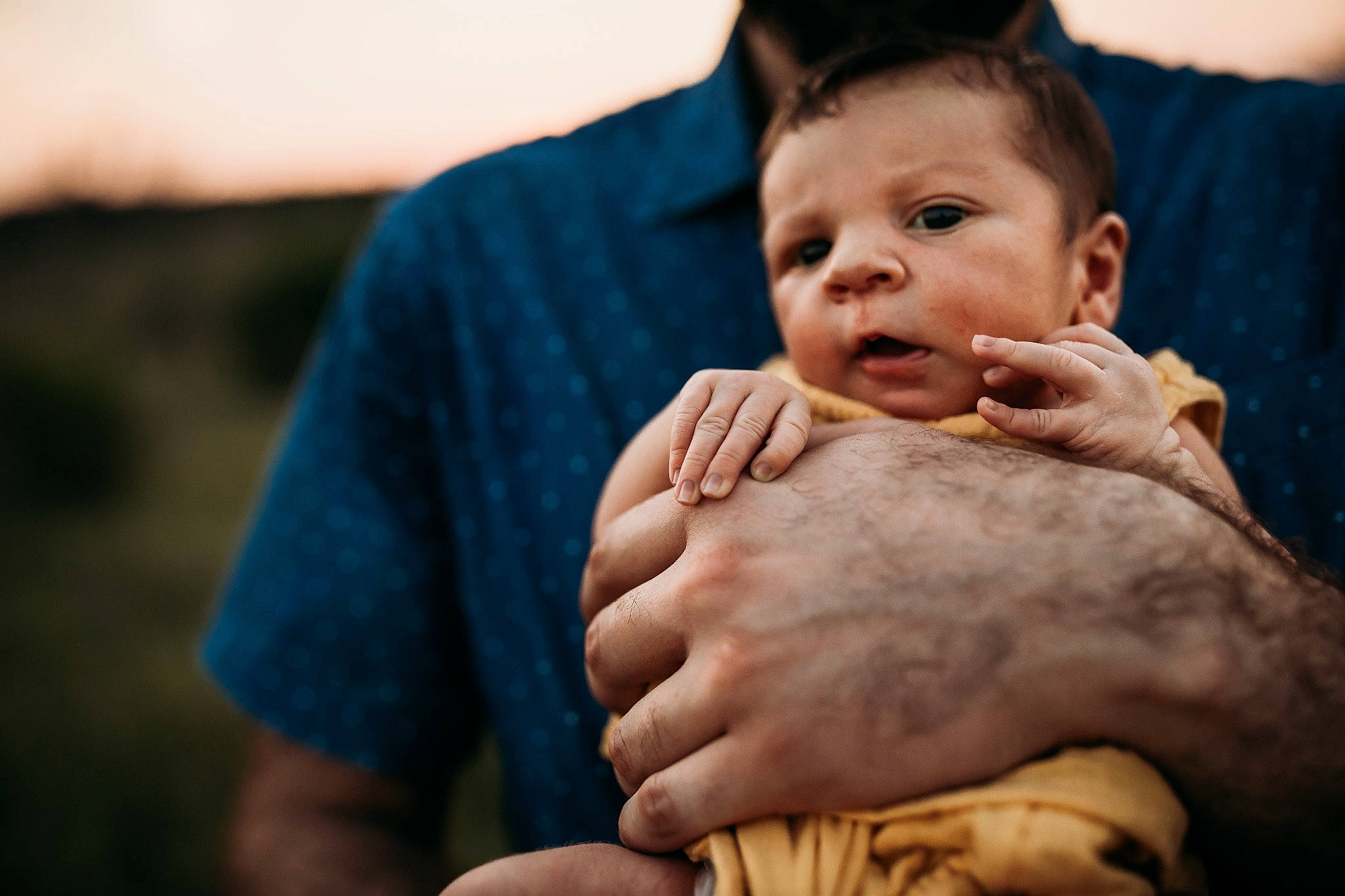 Lisa is registered to the contest to win money with this photo: baby, child, event, face, finger, flash_photography, formal_wear, fun, gesture, grass, hand, happy, jewellery, nail, people_in_nature, person, sitting, skin, sky, thumb