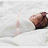 Paisley joined the competition — help win amazing prizes! newborn, baby, sleeping, wrapped, blanket, headband, bow, pink, white, soft, bed, cozy, peaceful, infant, portrait, cute, resting, child, toddler, indoors