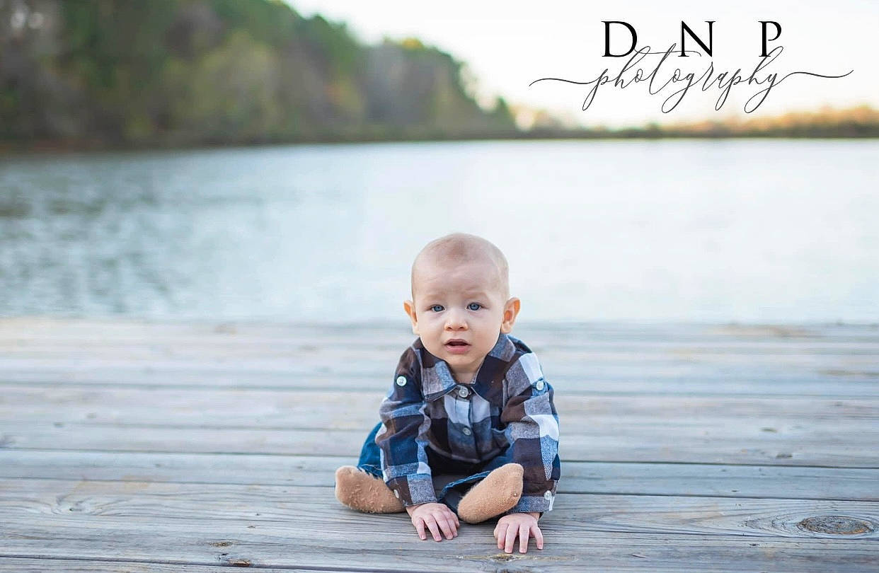 Weston joined the competition — help win amazing prizes! baby, baby_toddler_clothing, child, flash_photography, flooring, grass, happy, lake, lake_district, leisure, people_in_nature, person, portrait_photography, sitting, sky, stock_photography, toddler, tree, water, wood
