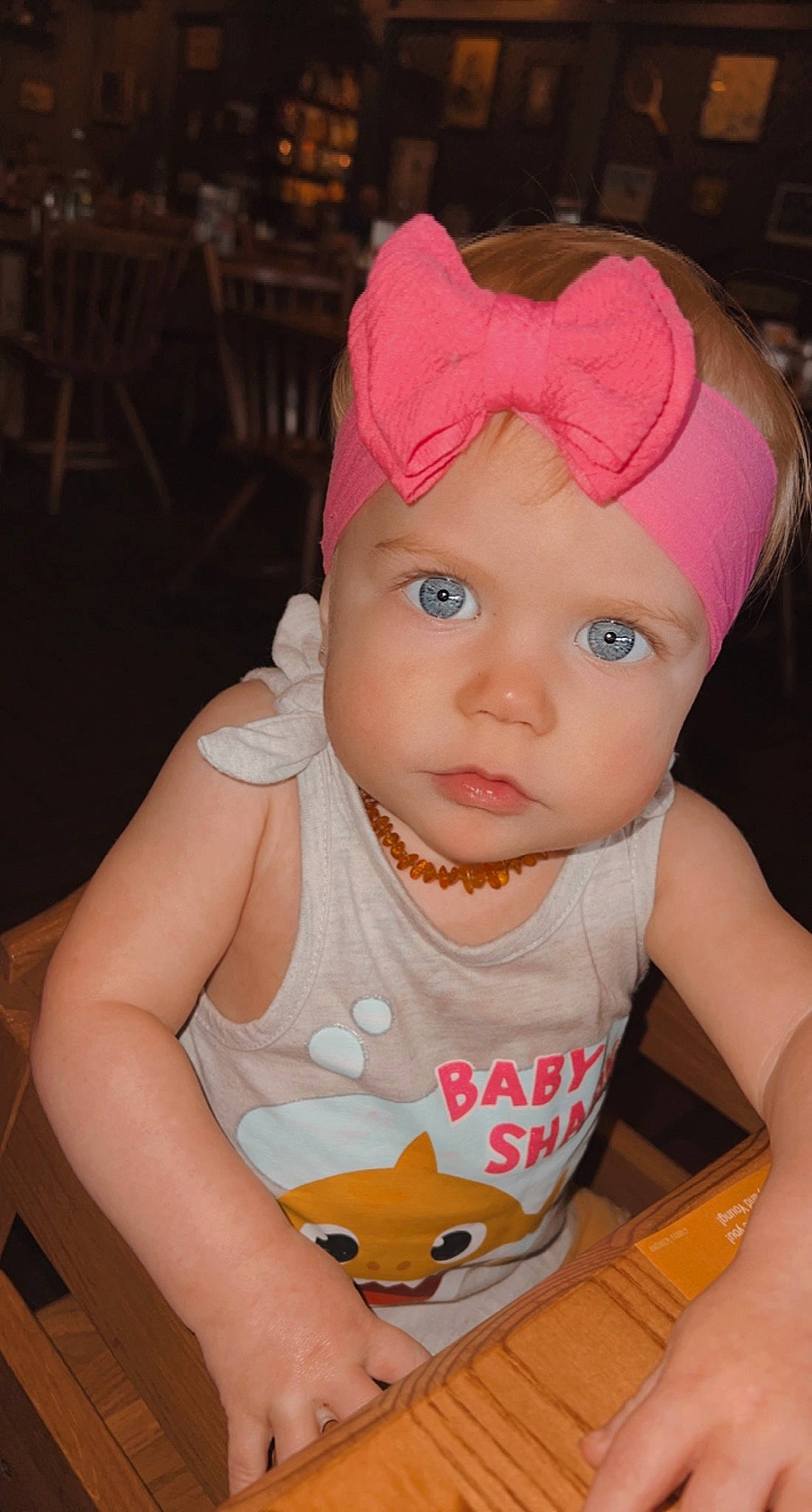 Emmi is registered to the contest to win money with this photo: baby, baby_toddler_clothing, cap, cheek, child, chin, eyebrow, eyelash, facial_expression, fashion_accessory, fun, happy, hat, headwear, lip, mouth, person, pink, skin, sleeve