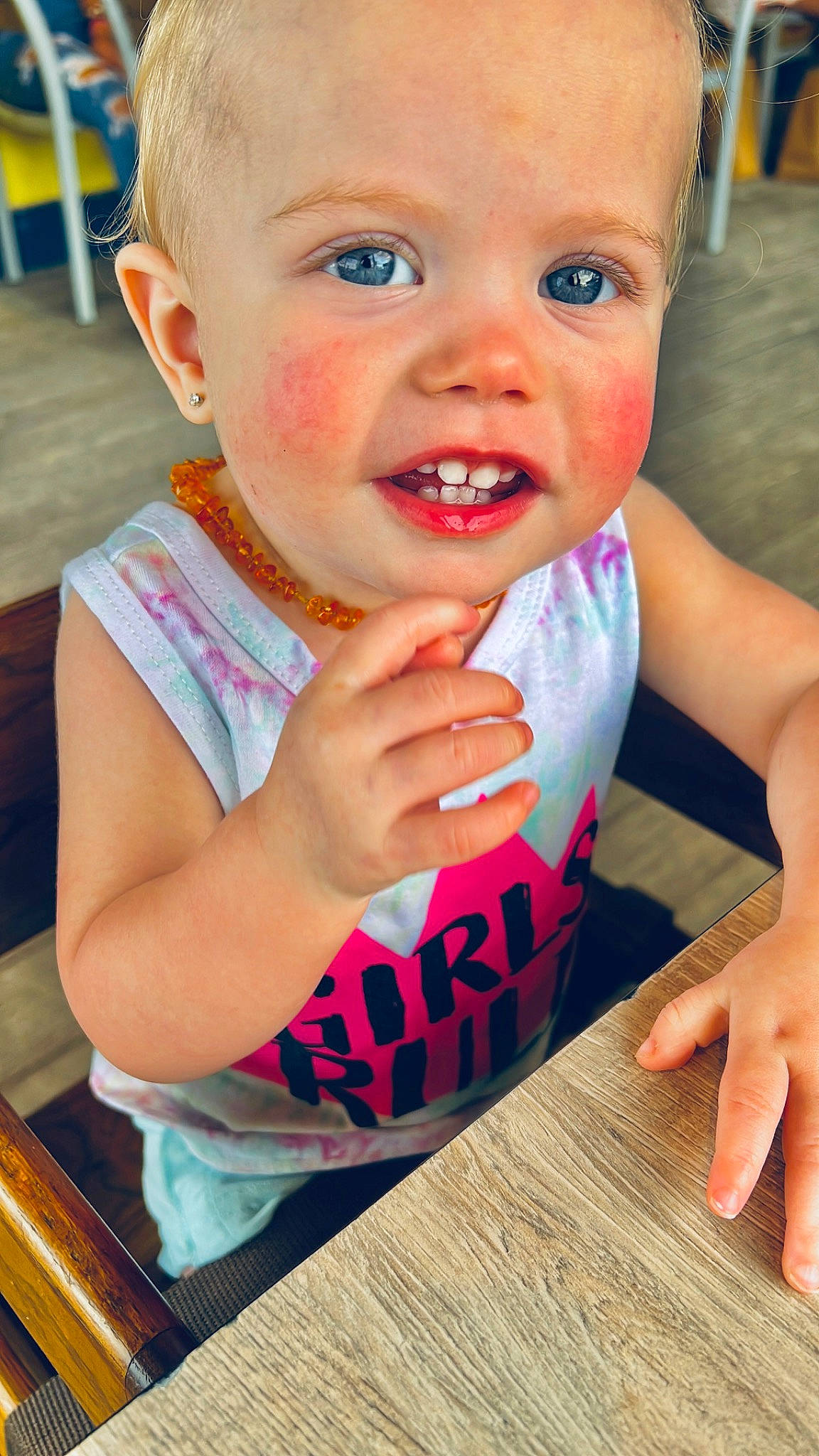 Emmi is registered to the contest to win money with this photo: baby_toddler_clothing, cheek, ear, finger, fun, gesture, hand, happy, iris, lip, mouth, nail, neck, nose, person, pink, skin, smile, t_shirt, thumb