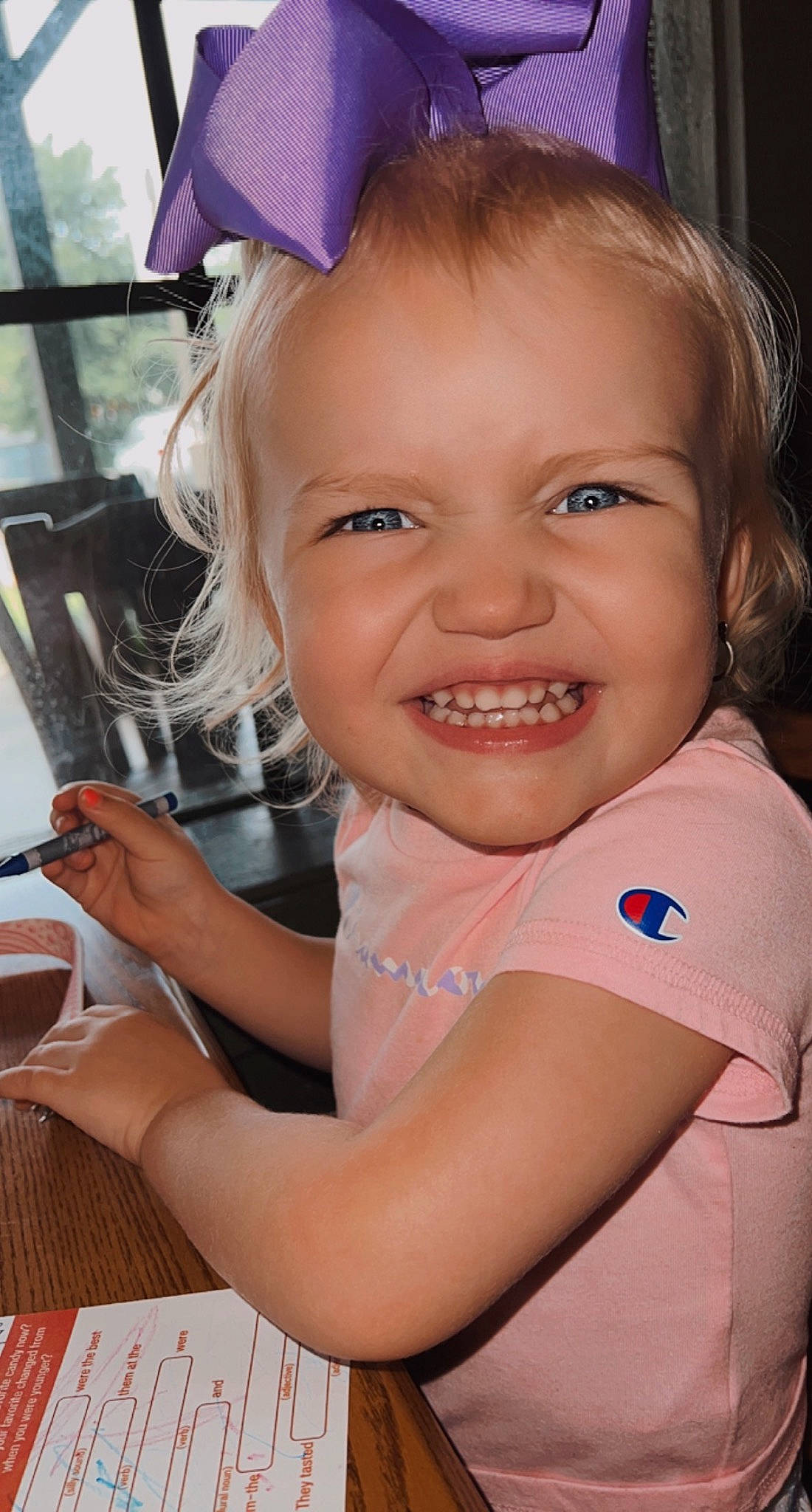 Kynslee is registered to the contest to win money with this photo: arm, blue, chair, child, facial_expression, finger, fun, hairstyle, hand, happy, iris, joy, leisure, lip, mouth, person, pink, skin, smile, summer