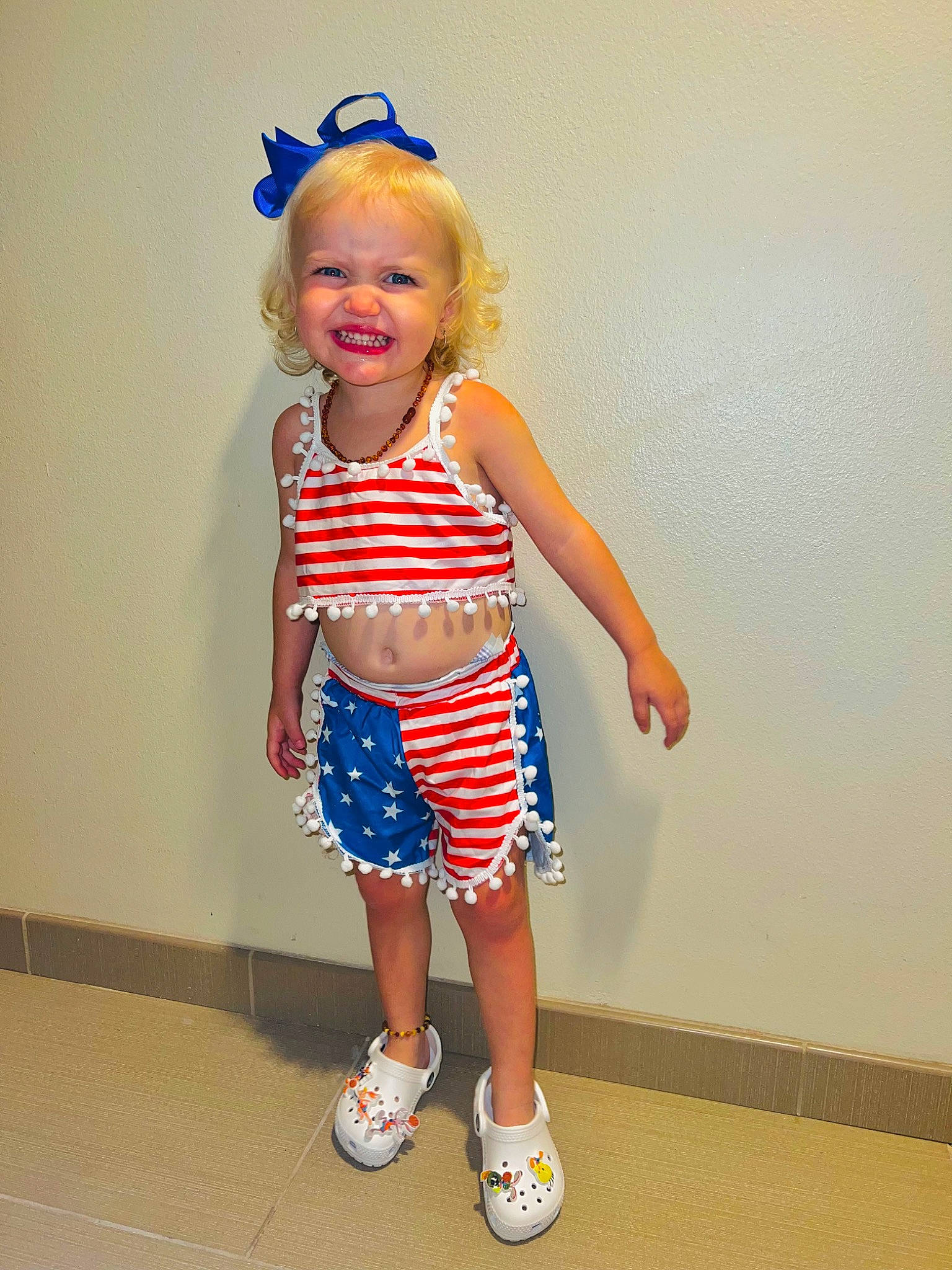 Kynslee is registered to the contest to win money with this photo: baby_toddler_clothing, blond, calf, child, electric_blue, eye, fashion_design, fun, hair, happy, human_leg, knee, pattern, person, shorts, sleeve, smile, sportswear, thigh, toddler