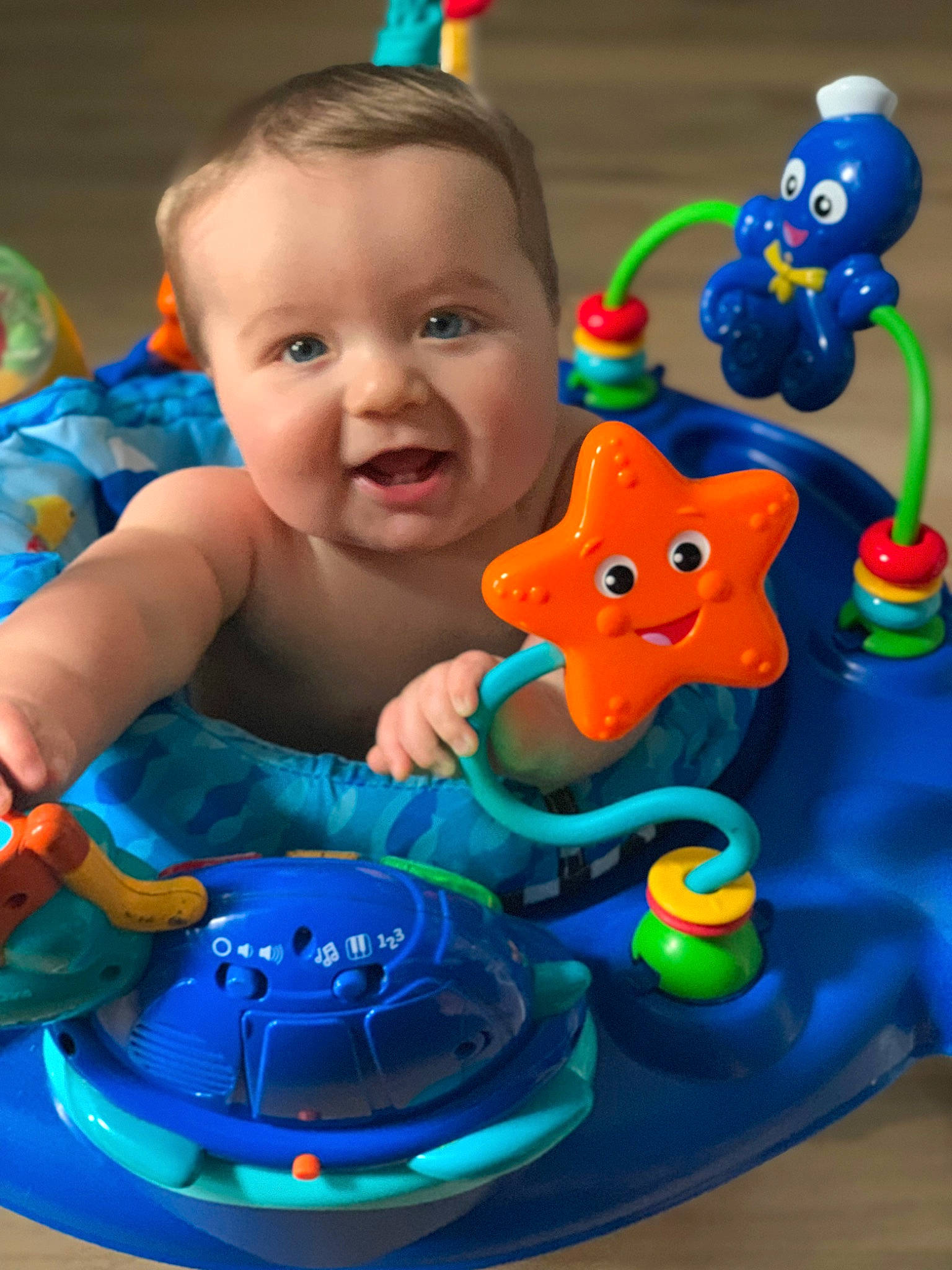 Brock is registered to the contest to win money with this photo: baby, baby_playing_with_toys, baby_products, baby_toys, blue, child, electric_blue, event, fictional_character, fun, green, happy, musical_instrument, person, plastic, play, product, recreation, smile, toddler