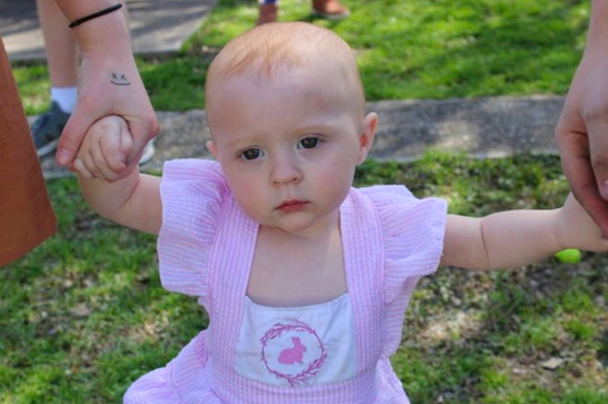 Blakely joined the competition — help win amazing prizes! baby, baby_toddler_clothing, face, facial_expression, finger, fun, gesture, grass, grass_family, hand, happy, head, leaf, leisure, person, pink, skin, sleeve, summer, thumb