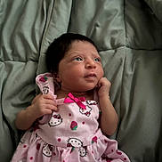 Icelynn joined the competition — help win amazing prizes! baby, infant, child, pink_dress, hello_kitty, blanket, bed, cute, portrait, lying_down, hand, face, expression, clothing, sleepwear, newborn, indoor, soft, adorable, resting