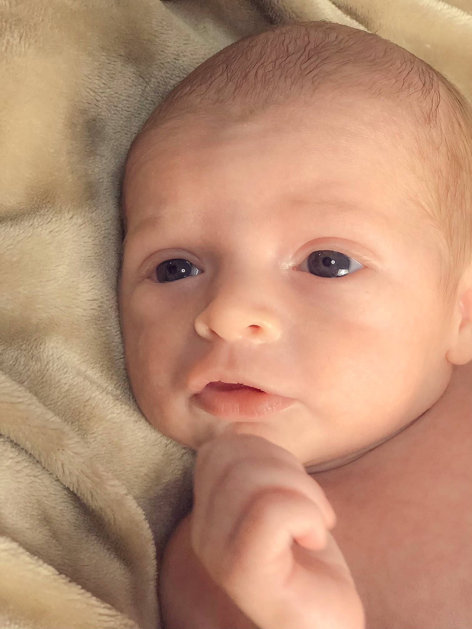 Layton is registered to the contest to win money with this photo: baby, cheek, chest, child, chin, eye, eyebrow, eyelash, face, finger, forehead, gesture, head, iris, lip, mouth, nose, person, skin, thumb