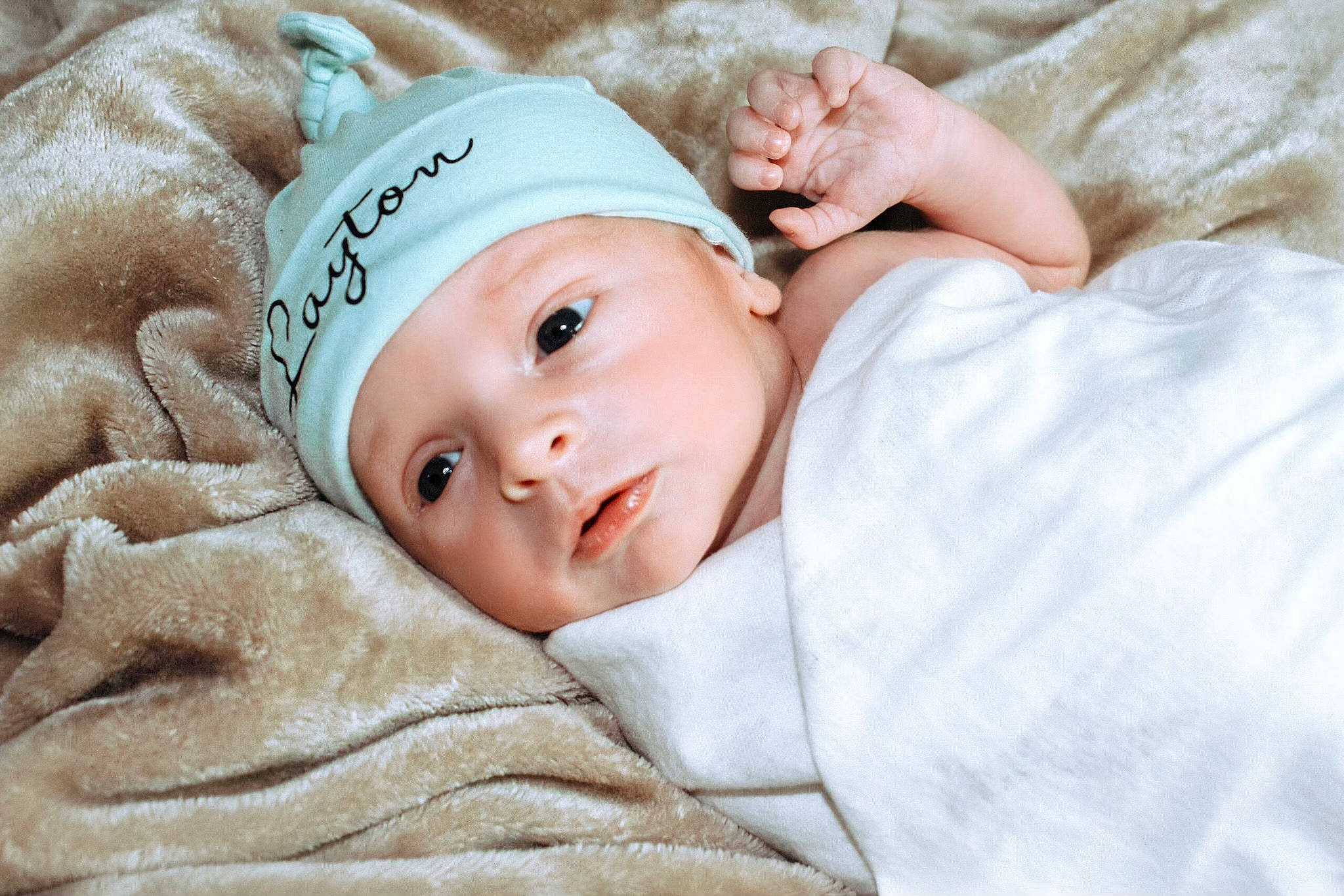 Layton is registered to the contest to win money with this photo: baby, baby_toddler_clothing, cheek, child, comfort, eye, eyelash, face, fashion_accessory, fur, grass, happy, head, headgear, headwear, linens, pattern, person, portrait_photography, skin