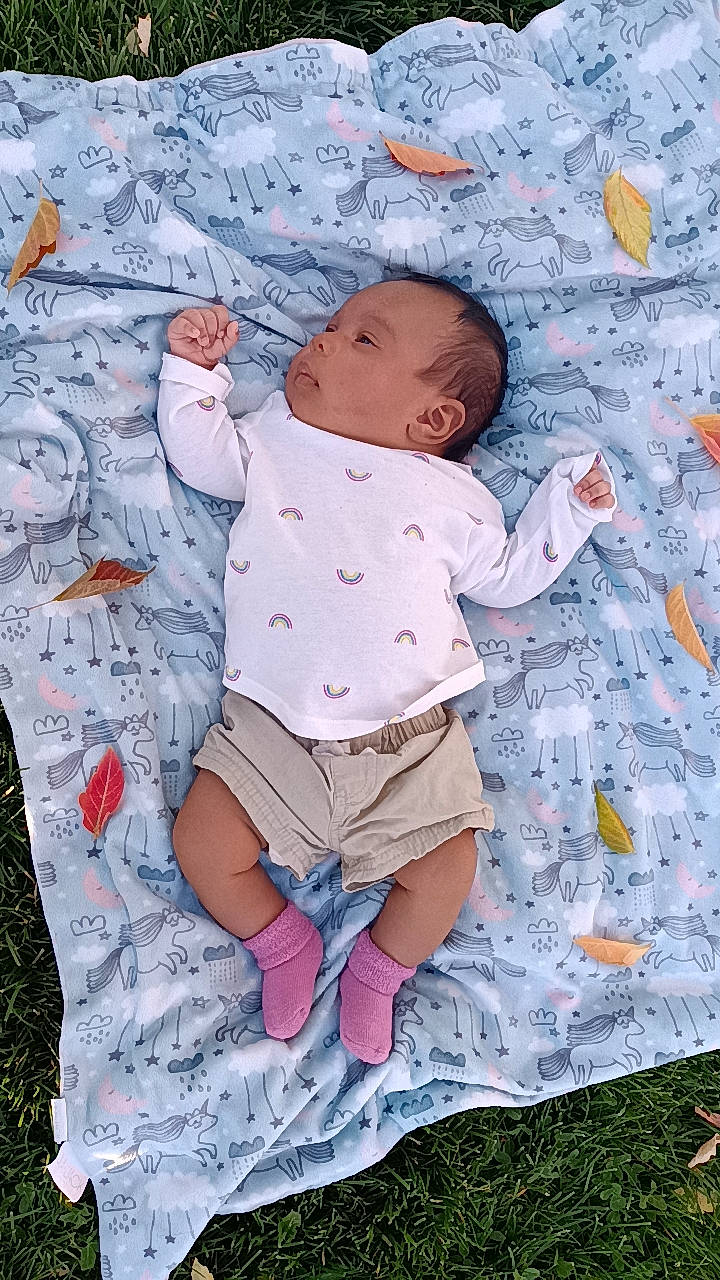 Cherish joined the competition — help win amazing prizes! baby, baby_toddler_clothing, child, grass, happy, linens, pattern, people_in_nature, person, pink, play, shorts, sitting, sleeve, t_shirt, textile, toddler