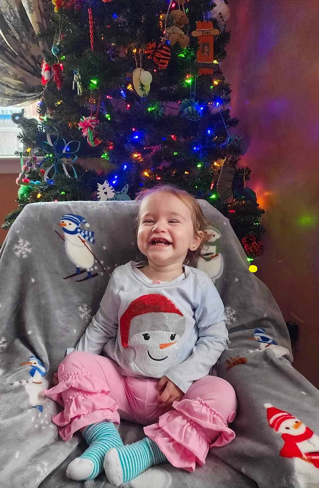 Emberly joined the competition — help win amazing prizes! baby_toddler_clothing, beauty, christmas_decoration, christmas_ornament, christmas_tree, facial_expression, fun, happy, head, holiday, human_body, joy, person, photograph, plant, purple, smile, standing, toddler, tree
