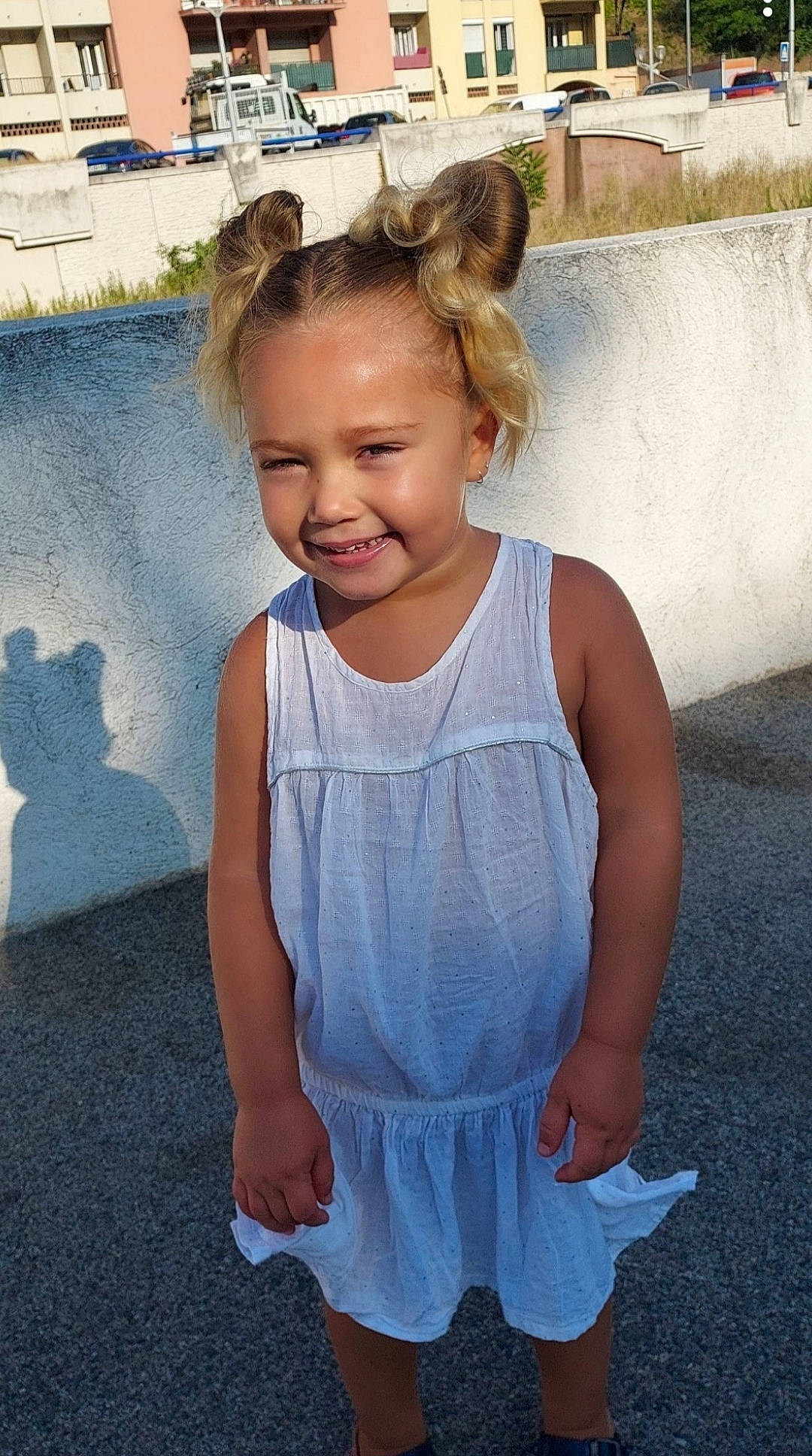 Jenna participe au concours pour gagner de l'argent avec cette photo : active_tank, azure, baby_toddler_clothing, day_dress, dress, electric_blue, gesture, hair, hairstyle, happy, head, joy, neck, one_piece_garment, person, photograph, shoulder, skin, sleeve, smile