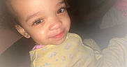Zaniyah-Ann joined the competition — help win amazing prizes! baby, brown_eyes, child, closeup, cute, earrings, expression, face, happy, indoor, pajamas, person, portrait, skin, sleepwear, smile, soft_light, toddler, yellow_clothing, young_child