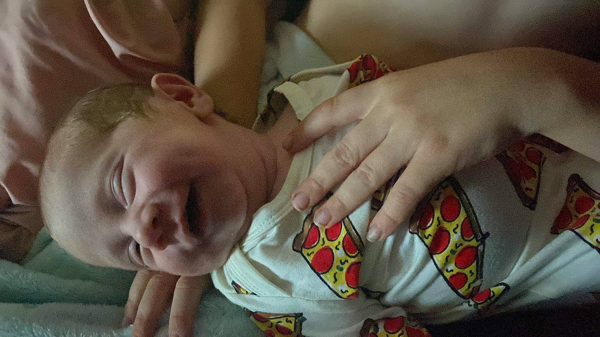 Kolten is registered to the contest to win money with this photo: baby, baby_toddler_clothing, comfort, elbow, eye, finger, gesture, hair, hand, happy, human_body, joint, mouth, muscle, nail, neck, person, skin, sleeve, textile