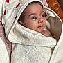 baby, blanket, child, curious, cute, eyes, face, hood, indoors, infant, newborn, portrait, red, skin, soft, texture, towel, white, wrapped, young