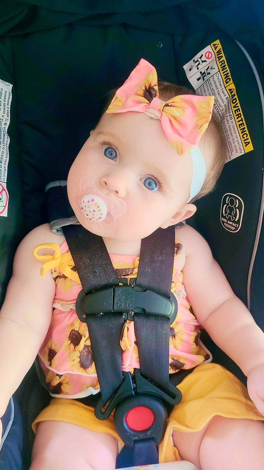 Evelynn is registered to the contest to win money with this photo: baby, baby_carriage, baby_products, baby_toddler_clothing, baby_toys, cheek, child, doll, eyelash, fashion_accessory, figurine, hat, nail, party_hat, person, pink, plastic, sitting, skin, toddler