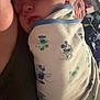 Ryker is registered to the contest to win money with this photo: baby, sleeping, blanket, mickey_mouse, swaddled, infant, cozy, soft, face, resting, child, indoors, comfort, peaceful, cute, person, portrait, young, clothing, nursery
