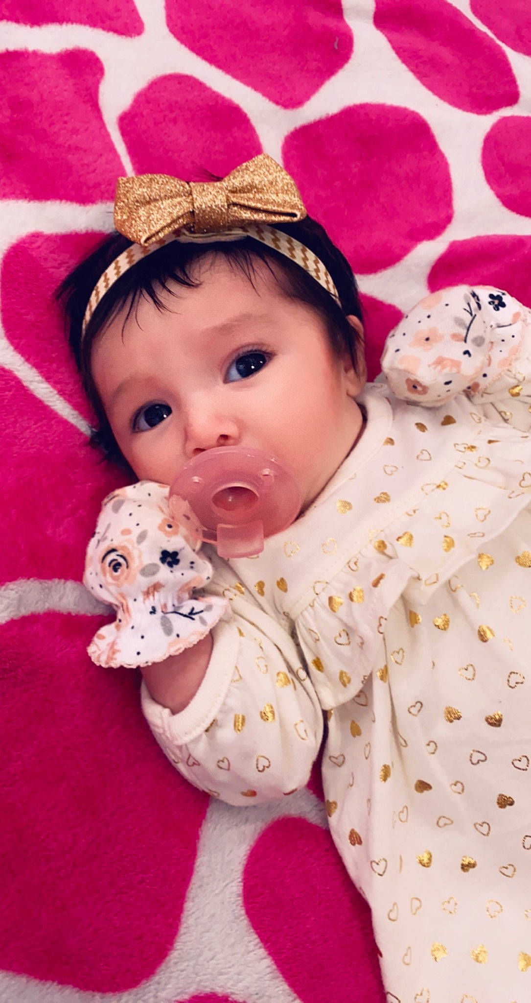 Mia joined the competition — help win amazing prizes! baby, baby_products, baby_toddler_clothing, cheek, child, collar, fashion_accessory, happy, headgear, linens, lip, magenta, pattern, peach, person, pink, product, skin, sleeve, textile