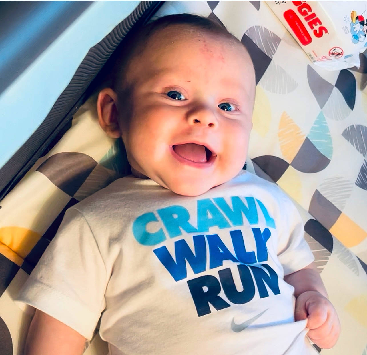 Bear joined the competition — help win amazing prizes! baby, baby_laughing, baby_toddler_clothing, child, cool, facial_expression, finger, fun, gesture, happy, human, mammal, mouth, people, person, product, sleeve, smile, t_shirt, toddler
