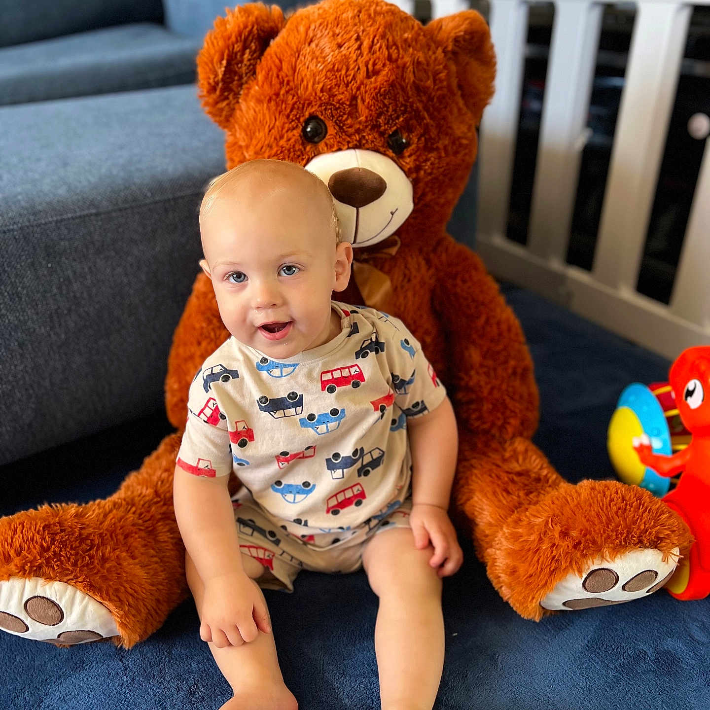 Weston joined the competition — help win amazing prizes! baby, couch, crib, cushion, doll, face, furniture, happy, head, homedecor, indoors, infantbed, person, photography, pillow, plush, portrait, sitting, teddybear, toy