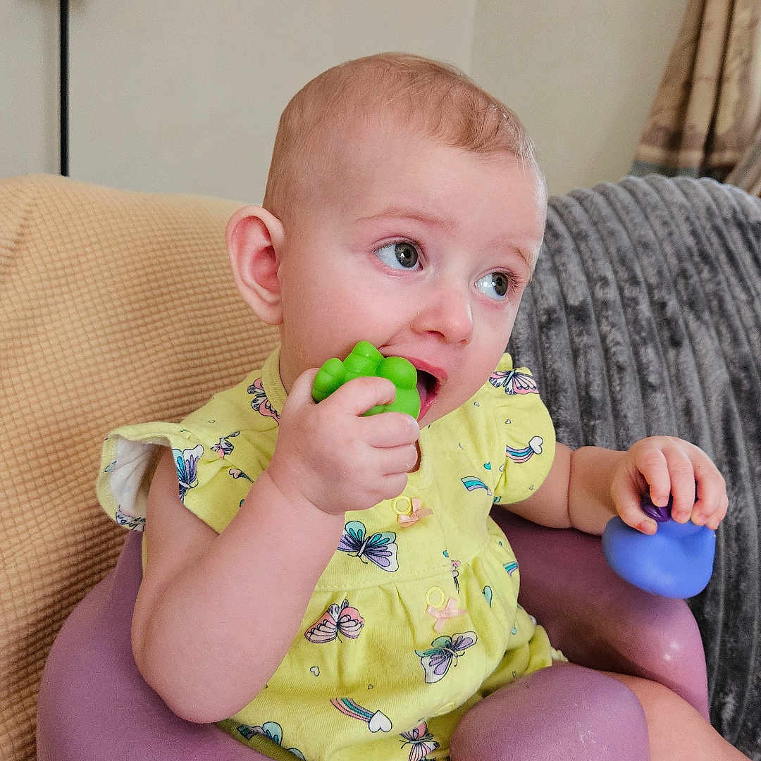 Grace Heaven joined the competition — help win amazing prizes! architecture, baby, bodypart, building, chair, couch, cushion, eating, face, finger, food, furniture, hand, head, homedecor, indoors, person, photography, portrait, sitting