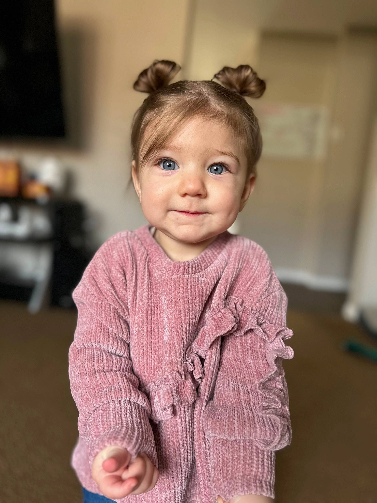 Aurora is registered to the contest to win money with this photo: baby, baby_toddler_clothing, cheek, child, embellishment, eyelash, fashion_accessory, flash_photography, flooring, fun, happy, iris, joy, magenta, pattern, person, sitting, skin, sleeve, smile