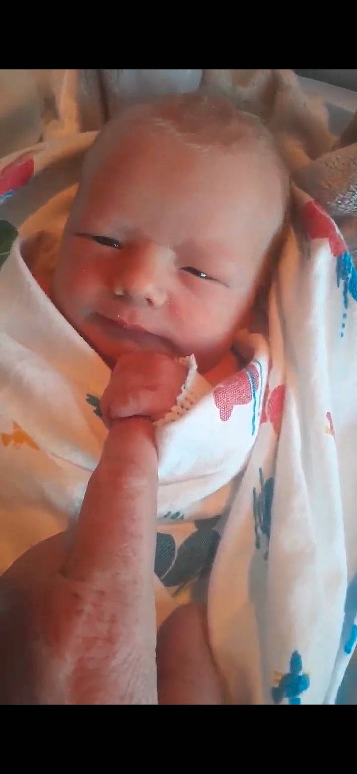 Kevin is registered to the contest to win money with this photo: baby, baby_toddler_clothing, cheek, chin, ear, eyebrow, eyelash, gesture, happy, head, human_body, iris, lip, mouth, neck, nose, person, skin, smile, thumb