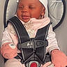 Kanyla joined the competition — help win amazing prizes! baby, infant, car_seat, child, smiling, closed_eyes, pink_clothing, white_socks, seatbelt, text_message, screenshot, mobile_phone, message_bubble, indoor, cute, sleepy, happy, person, wearing_hat, cozy