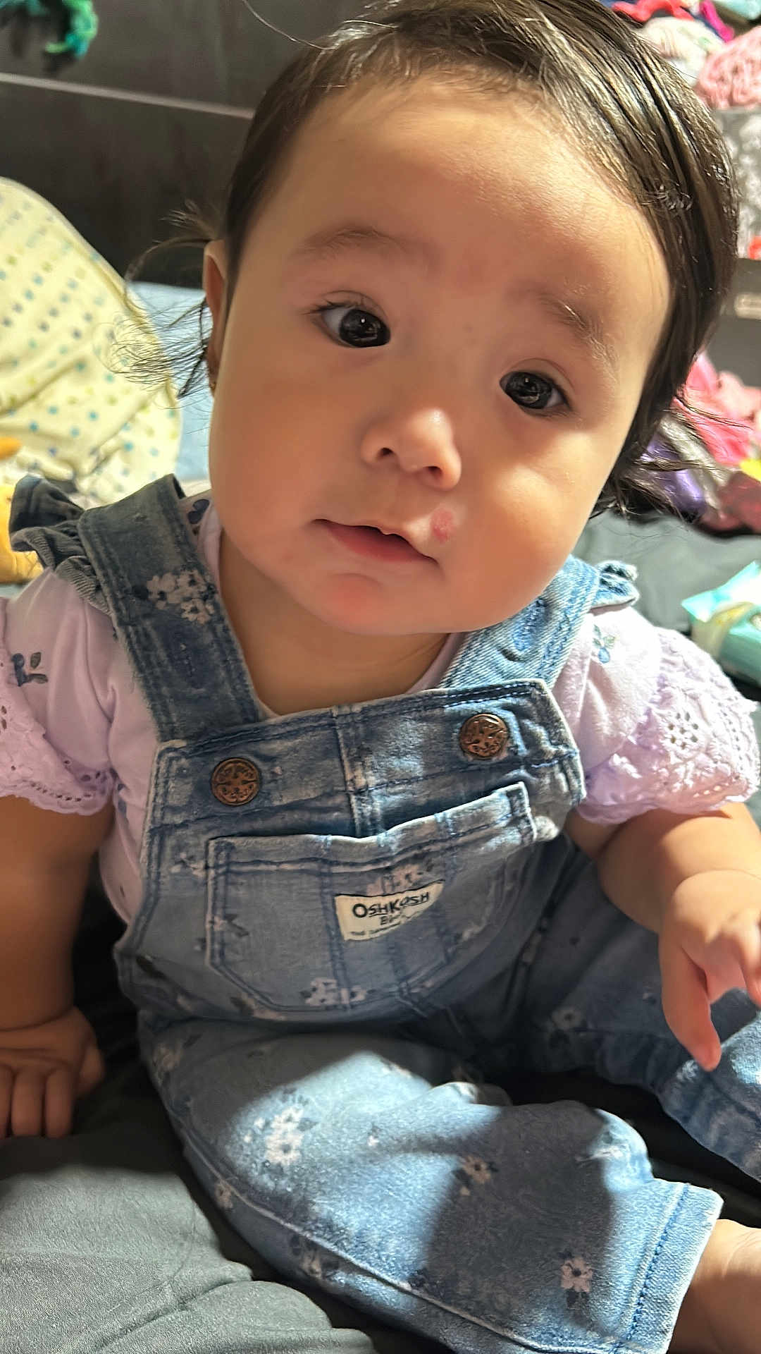 Natalie joined the competition — help win amazing prizes! applique, baby, bodypart, child, clothing, face, female, finger, girl, hand, head, jeans, pants, pattern, person, photography, portrait, shorts, sitting, vest