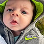 baby, child, face, hoodie, nike, clothing, blue_eyes, curious, outdoor, closeup, infant, cute, portrait, young, apparel, warm_clothing, expression, person, baby_face, hood