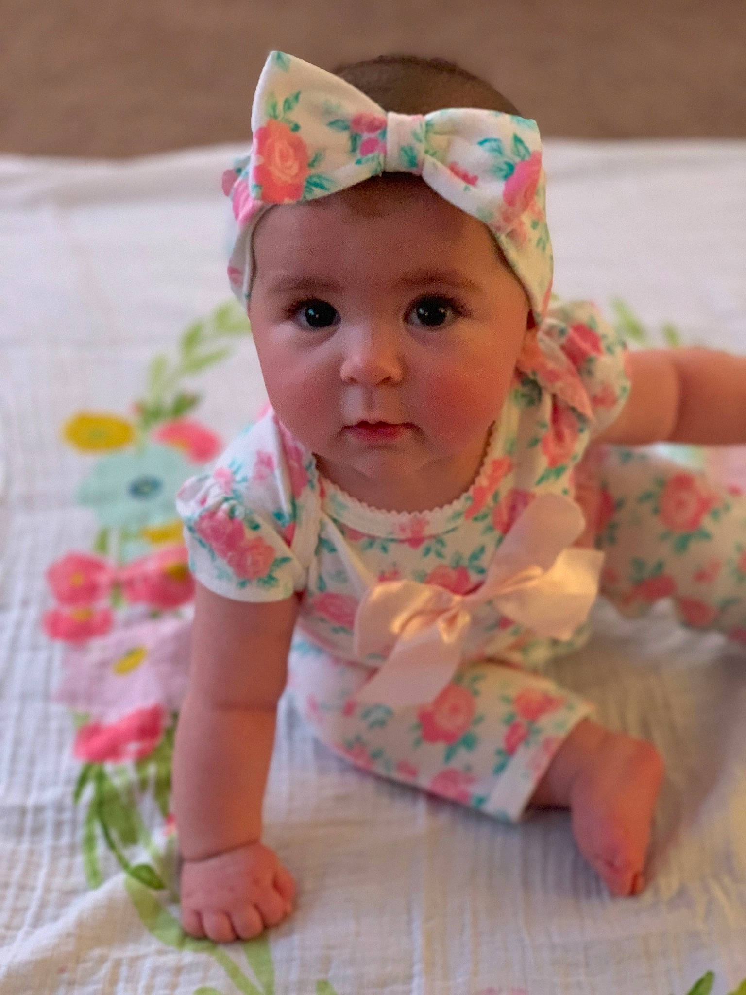 Aurora is registered to the contest to win money with this photo: baby, baby_toddler_clothing, cap, cheek, child, dress, eye, face, grass, happy, hat, head, headgear, headwear, lip, pattern, person, pink, skin, sleeve