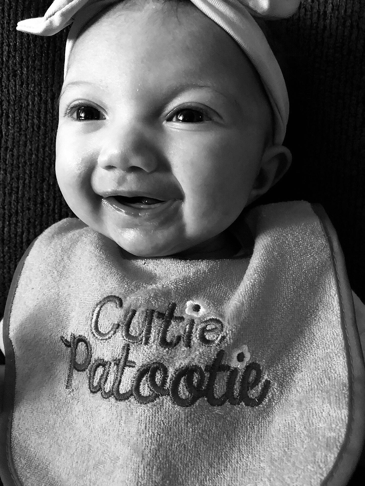 Aubrielle is registered to the contest to win money with this photo: black, black_and_white, cheek, child, emotion, eye, face, facial_expression, forehead, girl, head, human, monochrome, monochrome_photography, mouth, nose, person, photography, smile, white