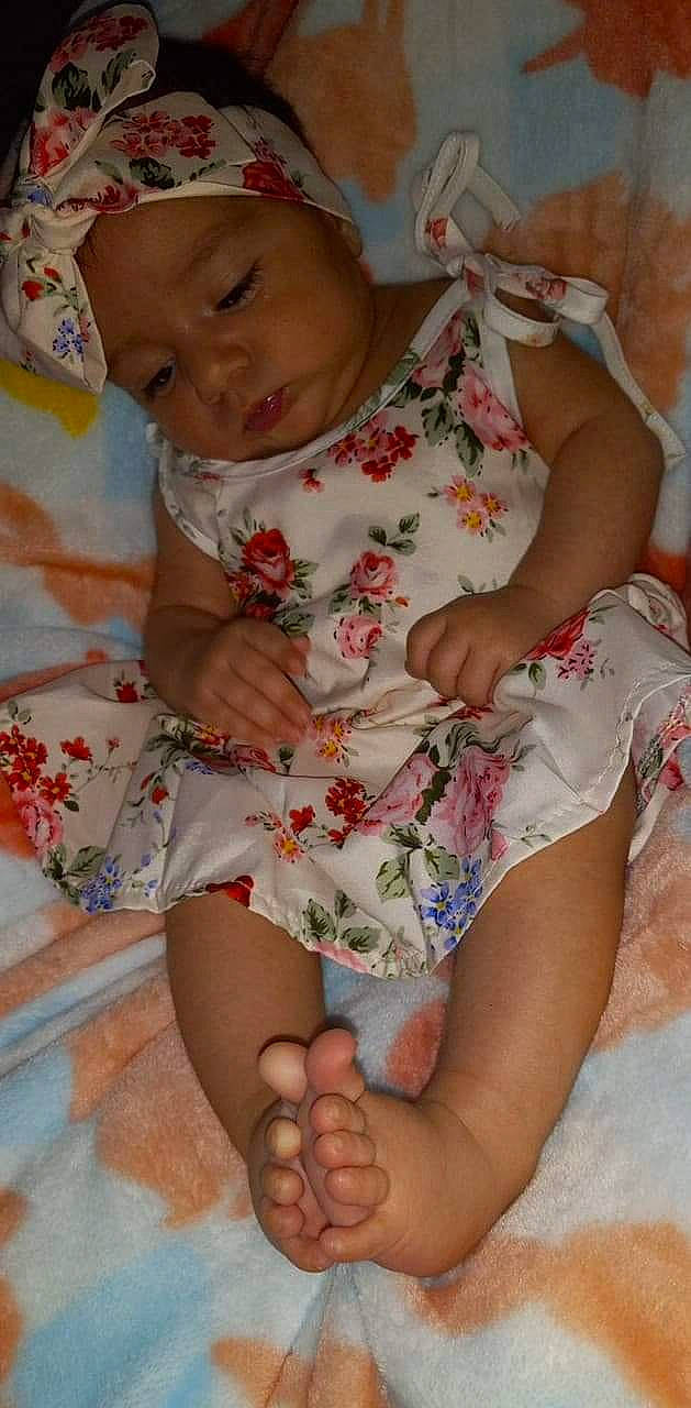 Izadora joined the competition — help win amazing prizes! arm, baby_toddler_clothing, cheek, comfort, face, facial_expression, finger, headwear, human_body, knee, lap, leg, mouth, nail, organ, person, pink, skin, textile, thigh