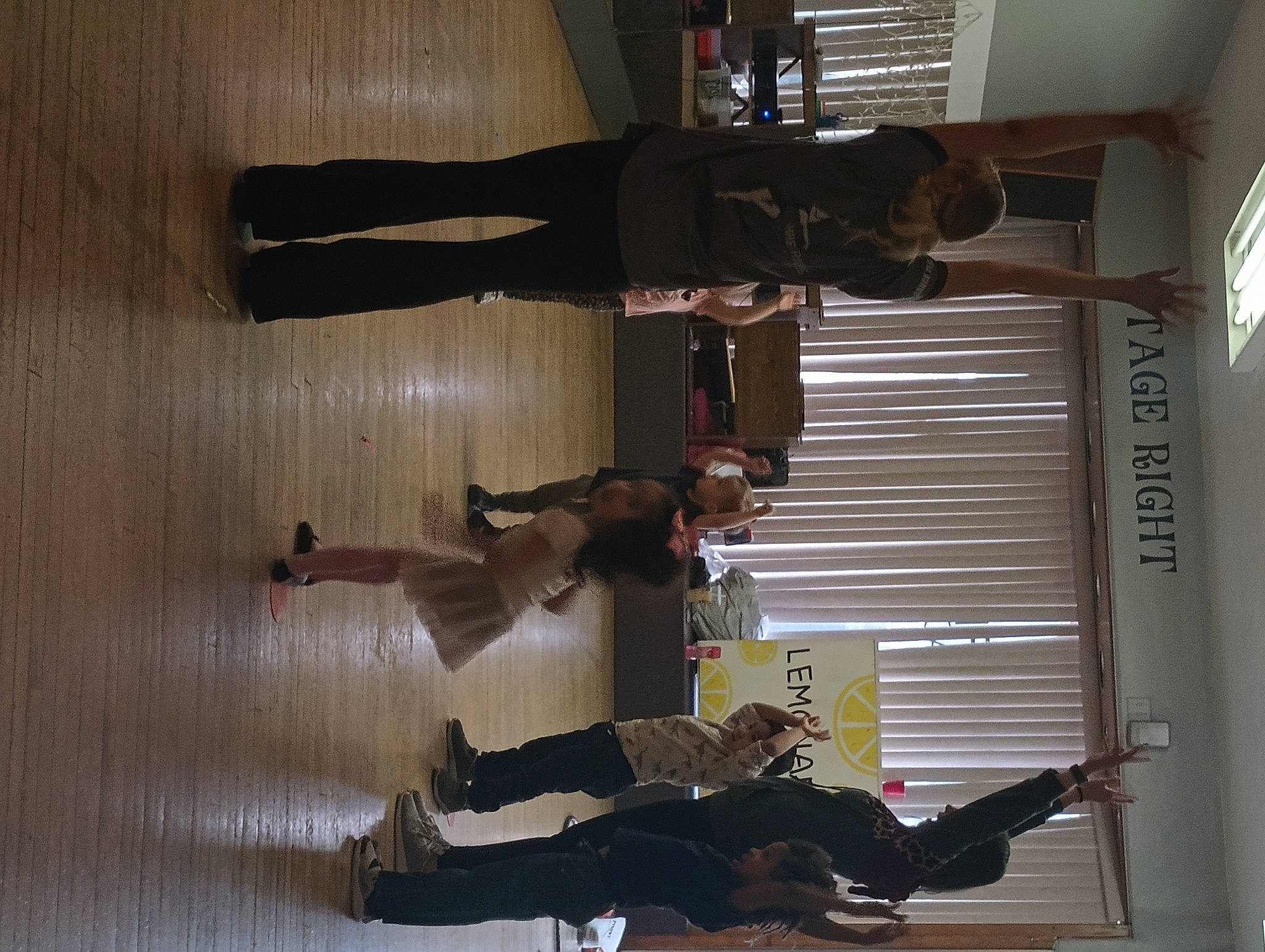 Itzayana joined the competition — help win amazing prizes! balance, black, event, flooring, footwear, hardwood, human_leg, ice_skating, knee, line, person, room, shoe, sock, suit, thigh, trousers, under_exposed, walking_shoe, wood