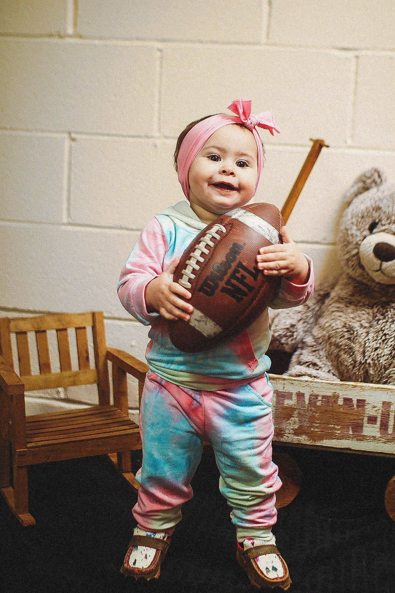 Rubii joined the competition — help win amazing prizes! baby, boot, chair, child, couch, flooring, fun, happy, hat, musical_instrument, person, personal_protective_equipment, play, room, sitting, smile, sneakers, t_shirt, toddler, toy