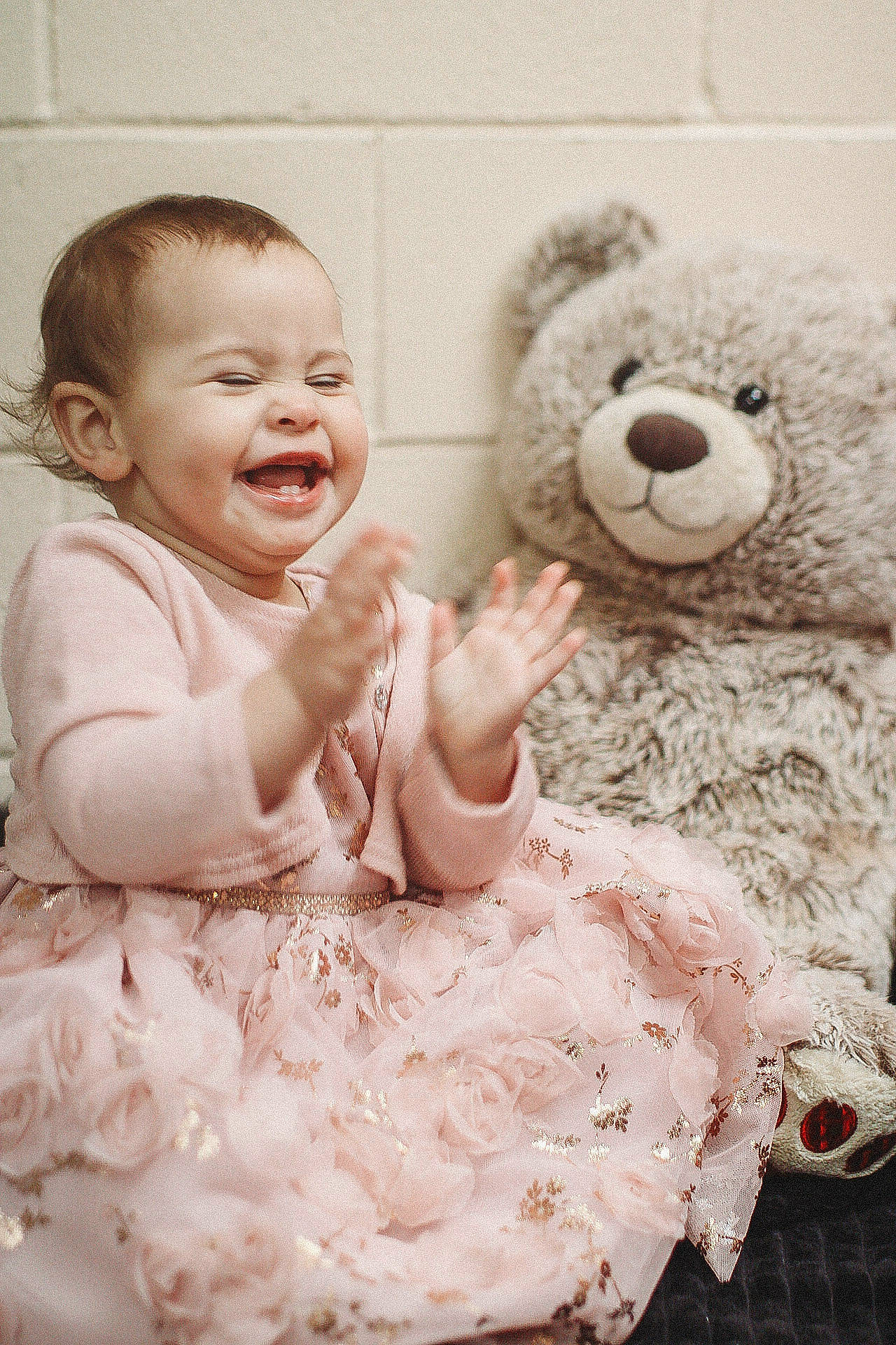 Rubii joined the competition — help win amazing prizes! baby, baby_toddler_clothing, comfort, dress, flash_photography, gesture, hand, happy, head, human_body, interaction, nose, person, pink, skin, smile, stuffed_toy, teddy_bear, textile, toddler