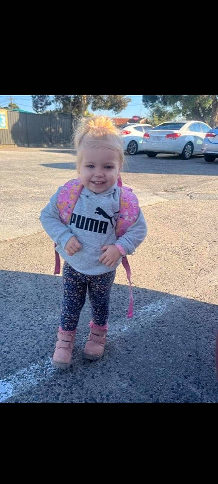 Poppie joined the competition — help win amazing prizes! asphalt, baby, car, cool, fun, grass, happy, joy, leaf, person, pink, plant, recreation, road_surface, sleeve, smile, standing, t_shirt, tire, toddler