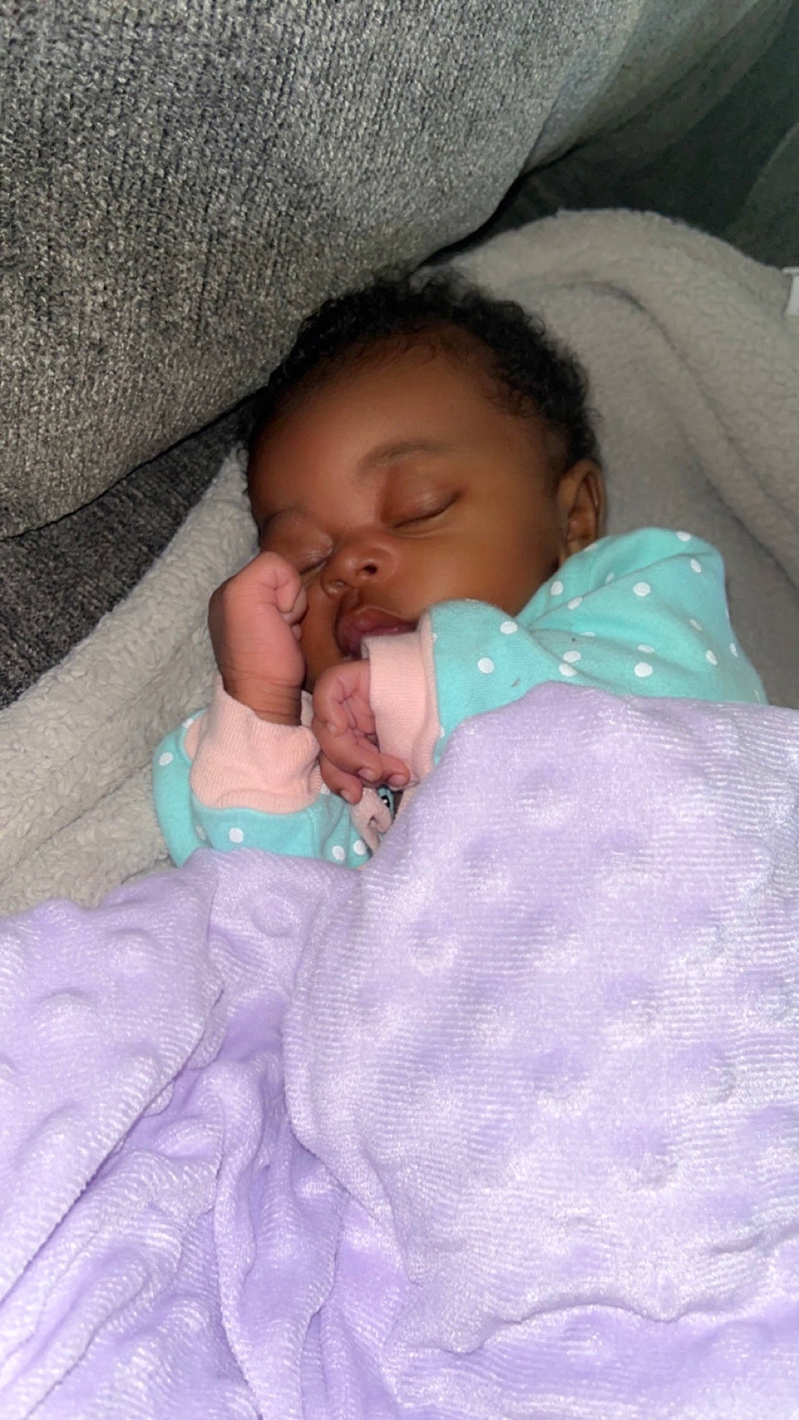 Kaleah is registered to the contest to win money with this photo: baby, baby_sleeping, baby_toddler_clothing, bedding, bedtime, cheek, child, comfort, facial_expression, finger, head, iris, linens, mouth, nose, organ, person, room, skin, textile