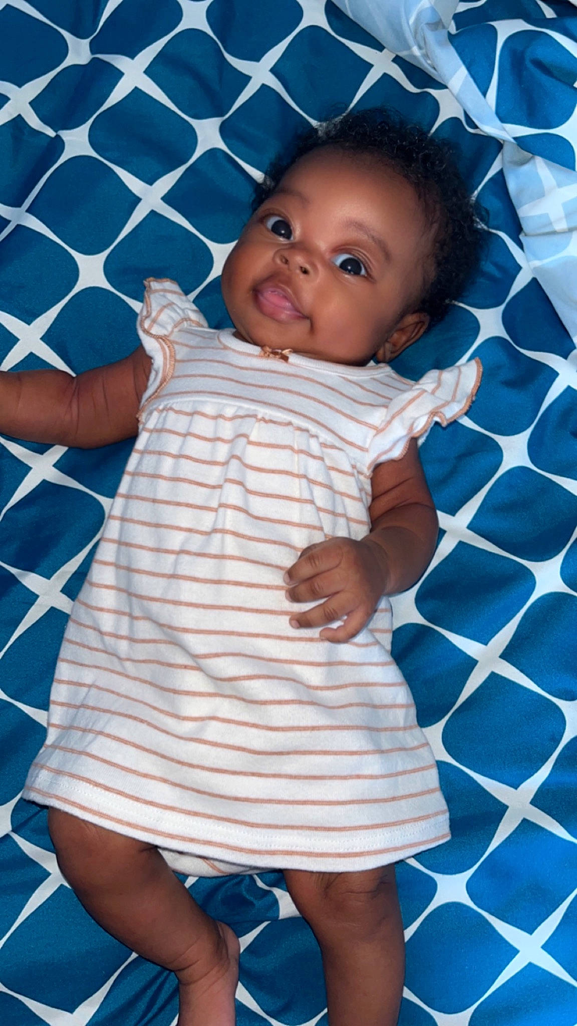 Kaleah joined the competition — help win amazing prizes! azure, baby_toddler_clothing, blue, dress, electric_blue, eye, face, finger, hairstyle, happy, joint, one_piece_garment, pattern, person, purple, skin, sleeve, smile, textile, toddler