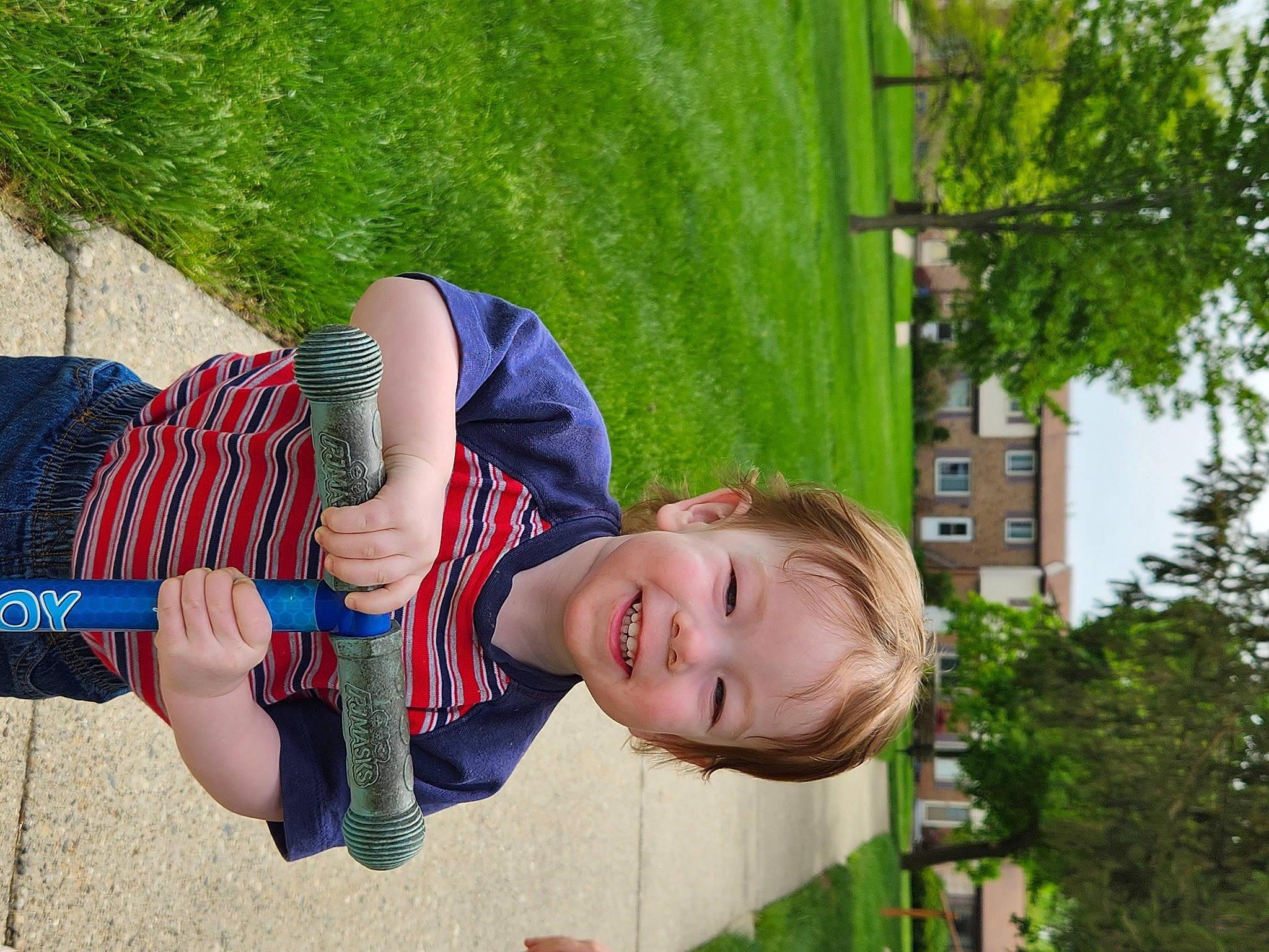 Zechariah joined the competition — help win amazing prizes! child, electric_blue, fun, garden, grass, green, happy, joy, leisure, outdoor_play_equipment, people_in_nature, person, photograph, plant, play, recreation, smile, summer, t_shirt, toddler