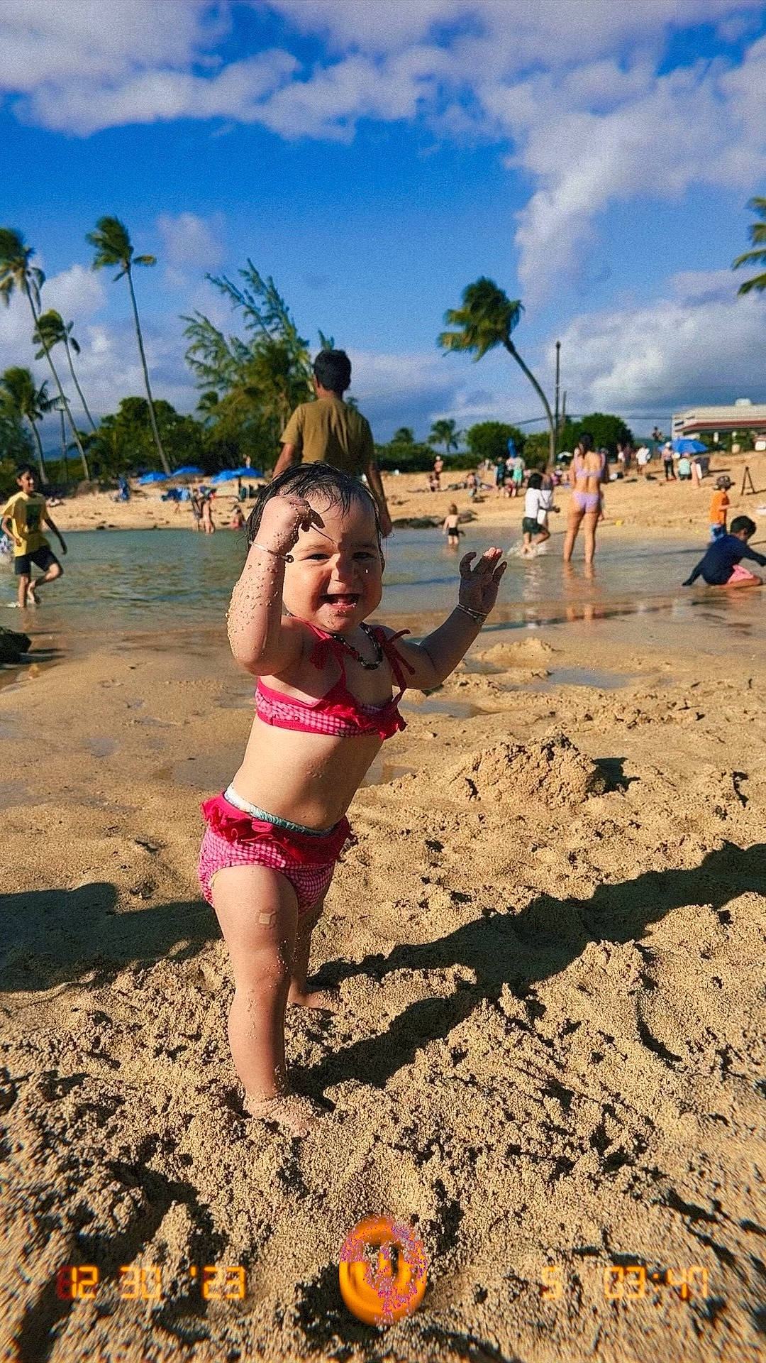 Braisley is registered to the contest to win money with this photo: arecales, beach, body_of_water, brassiere, cloud, fun, happy, hat, leisure, people_on_beach, person, plant, shorts, sky, swimsuit_top, swimwear, thigh, travel, tree, undergarment