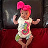 Anslee is registered to the contest to win money with this photo: baby, bare_feet, casual, child, colorful_clothing, cute, expression, headband, indoor, infant, leather_couch, person, pink_bow, portrait, red_blanket, seahorse, shorts, sitting, small_hands, white_shirt