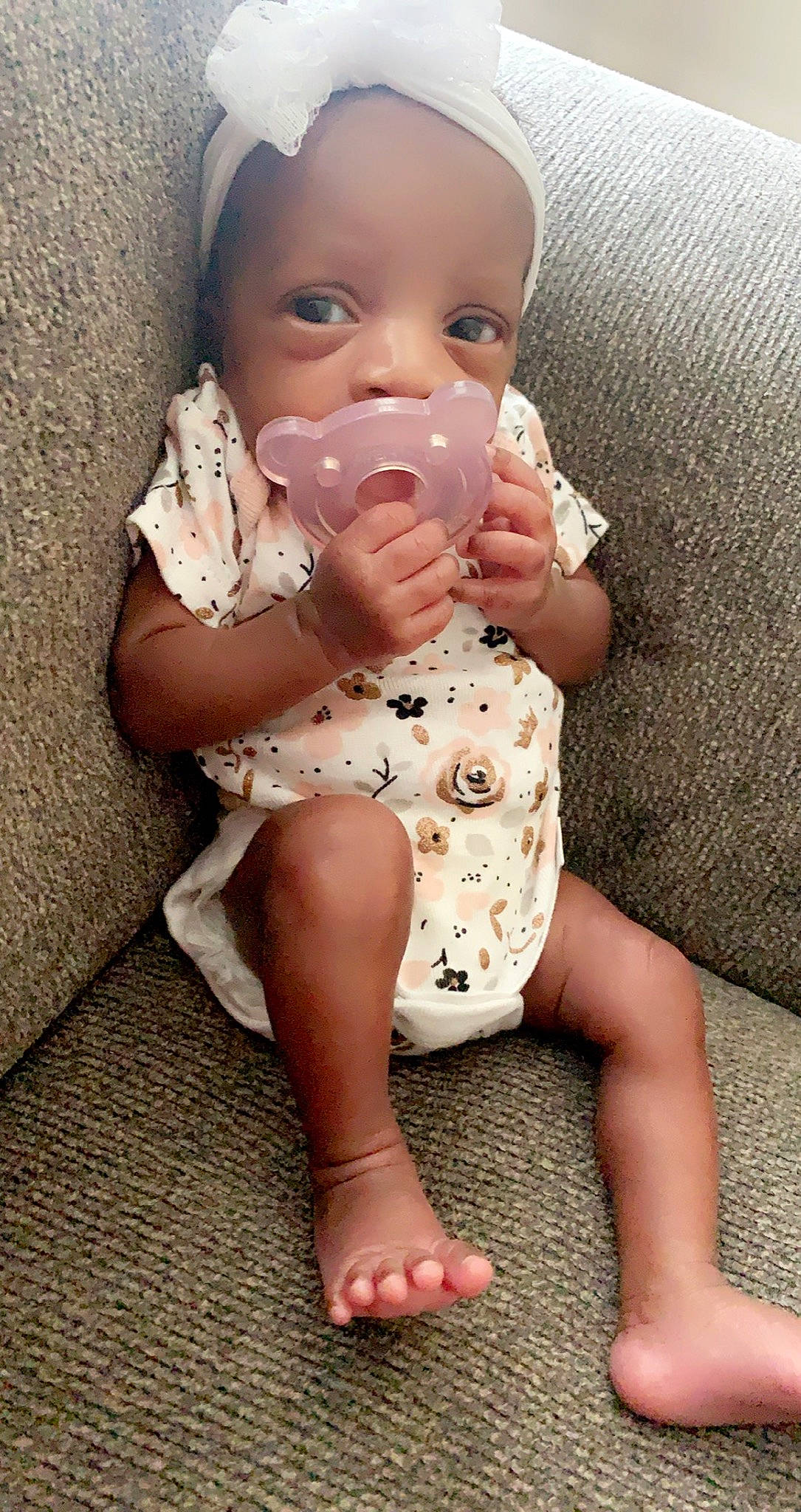 Kori is registered to the contest to win money with this photo: baby, baby_toddler_clothing, child, person, sitting, toddler