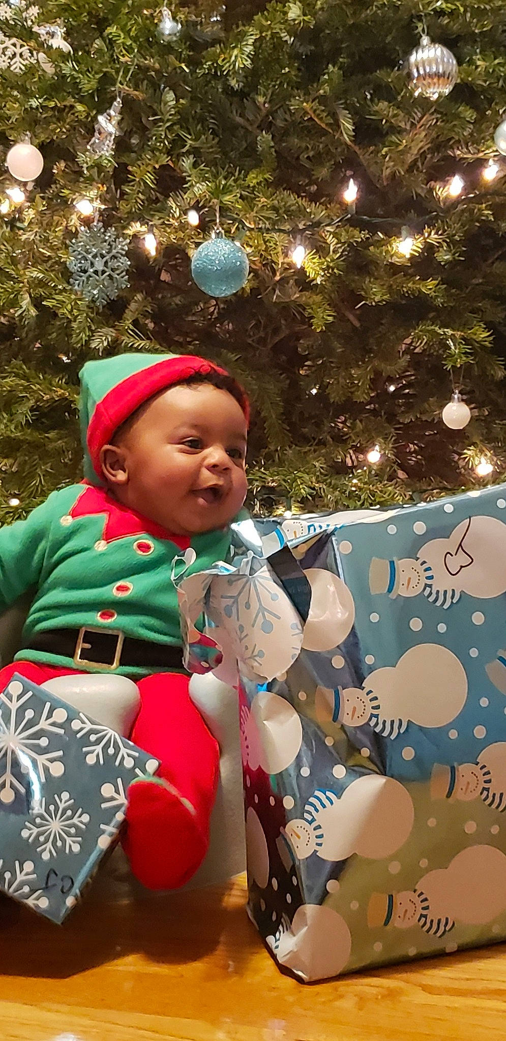 Cj joined the competition — help win amazing prizes! baby, baby_toddler_clothing, child, christmas, christmas_decoration, christmas_eve, christmas_lights, christmas_ornament, christmas_tree, costume_accessory, event, fictional_character, holiday, holiday_ornament, human, interior_design, ornament, person, toddler, tradition