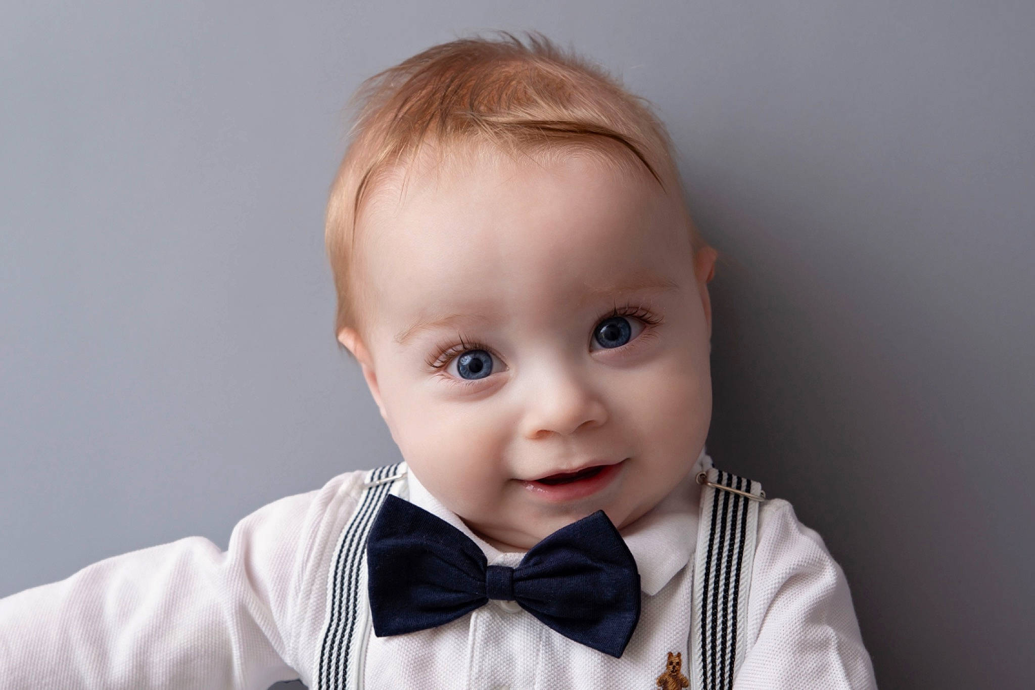 Emilio joined the competition — help win amazing prizes! baby, bow_tie, clothing, collar, dress, dress_shirt, drinkware, eye, eyelash, flash_photography, hair, head, human_body, iris, lip, neck, outerwear, person, sleeve, smile