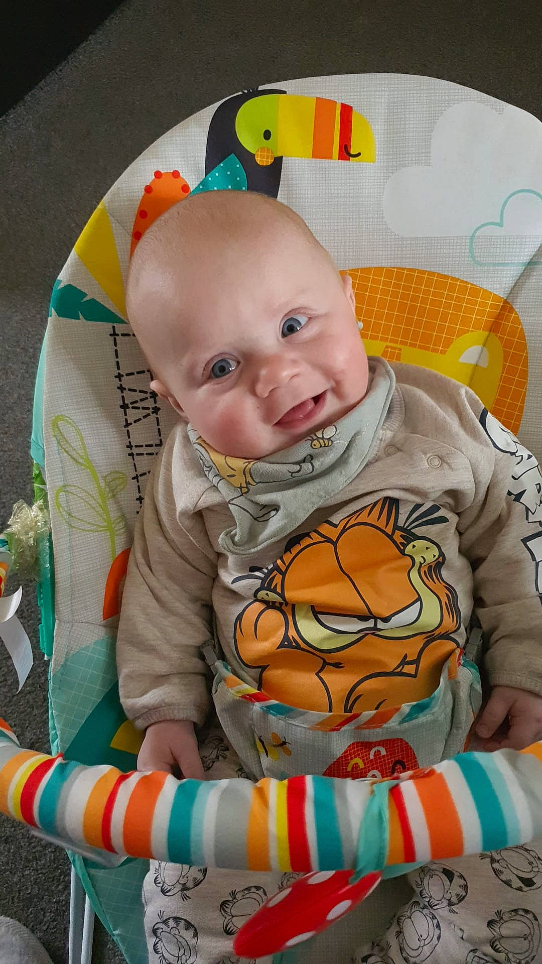 Caleb joined the competition — help win amazing prizes! baby, baby_toddler_clothing, ball, cheek, child, comfort, eye, facial_expression, human_body, mouth, nose, orange, organ, person, sleeve, smile, spider_man, textile, toddler, white