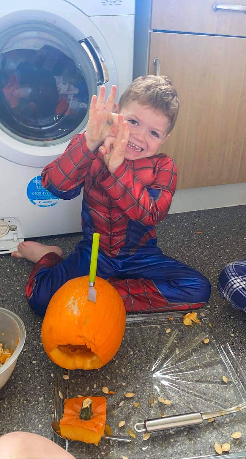 Jacob joined the competition — help win amazing prizes! calabaza, clothes_dryer, cucurbita, eye, fun, gourd, head, home_appliance, jack_o_lantern, laundry, laundry_room, major_appliance, natural_foods, orange, person, pumpkin, squash, toddler, vegetable, washing_machine